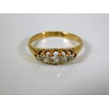 An 18ct gold five stone Victorian diamond ring 2.3