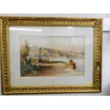 A framed watercolour depicting estuary scene signe