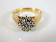 An 18ct gold diamond cluster ring 4.4g