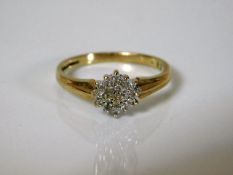 A 9ct gold diamond cluster ring 2.2g