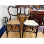 A pair of rosewood bedroom chairs, one reupholster