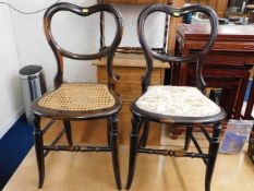 A pair of rosewood bedroom chairs, one reupholster