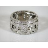 An 18ct white gold reticulated band ring set with approx. 1ct diamonds 10.4g