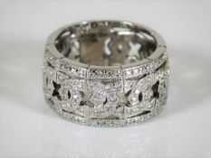 An 18ct white gold reticulated band ring set with approx. 1ct diamonds 10.4g