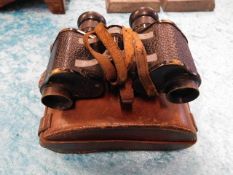 A pair of military binoculars with double ended ki