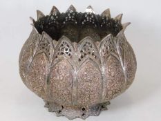 A c.1900 Burmese style silver on copper pot, profu