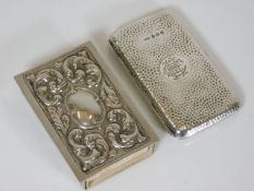 A hammered silver cigarette case, inscribed, twinn
