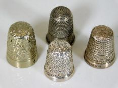 Three silver thimbles & one white metal