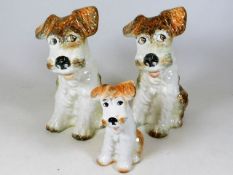 A pair of Sylvac dogs 8in & one other