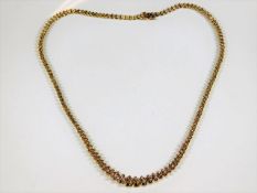 A 14ct gold diamond necklace with approx. 146 ston