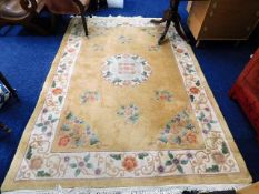 A large Chinese wool rug, 100in x 67in