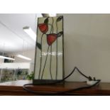 A Tiffany style glass lamp, indistinctly signed to rear