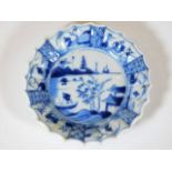 A small 18thC. Chinese porcelain dish with scallop