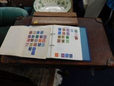 Two child's stamp albums, a leather suitcase, a wr