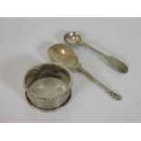 A silver napkin ring & two spoons