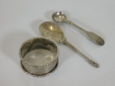 A silver napkin ring & two spoons