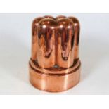 An antique copper jelly mould