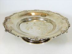 A silver footed bowl with scroll work edge 580g