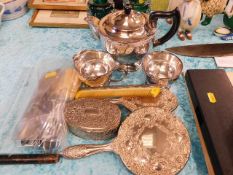 A silver plated tea set twinned with other plated