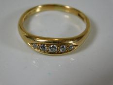 An 18ct gold ring set with diamond 5.1g