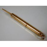 An 18ct gold French marked cigar piercer 4.6g