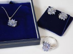 A 9ct white gold & tanzanite necklace, pendant, ea