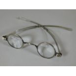 A George III silver mounted set of spectacles