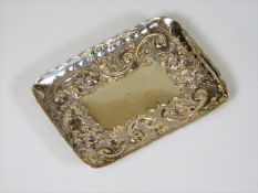 A small silver dish of good gauge with embossed de