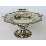 A two handled silver tazza with reticulated design