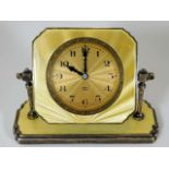 A silver mounted art deco period clock with guillo