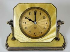 A silver mounted art deco period clock with guillo