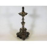 A 17thC. Spanish silver candlestick later converte