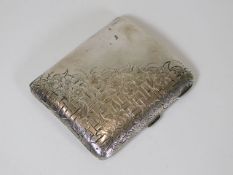 A silver cigarette case with chased honeysuckle &