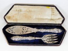 A substantial cased silver fish knife & fork set w