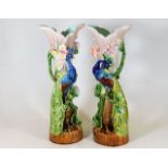 A pair of continental studio peacock spill vases