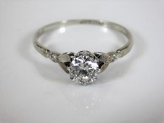 An 18ct gold & platinum ring set with 0.75ct diamo