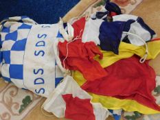 A Military Special Duty Service SDS bag containing 42 flags