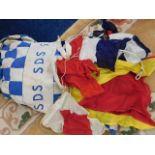 A Military Special Duty Service SDS bag containing 42 flags