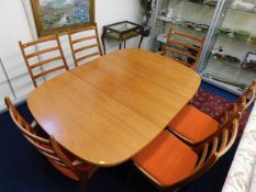 A G-Plan extending dining table set with six 1960'