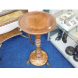A Victorian pedestal plant stand with rosewood bas