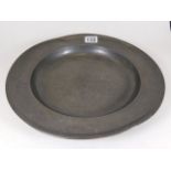 A large 19thC. pewter plate