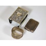 A silver vesta holder, a silver vesta case & a sil