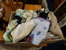 A box of mostly silk items of clothing including s