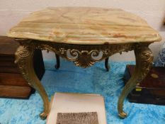 A marble topped brass table