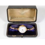 A boxed 18ct gold case ladies watch with gold plat