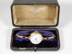 A boxed 18ct gold case ladies watch with gold plat