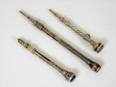 Three white metal self propelling pencils