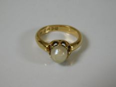 An 18ct gold ring set with cultured pearl a/f 4.2g