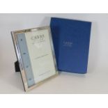 A Carrs boxed silver photo frame