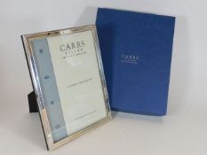A Carrs boxed silver photo frame